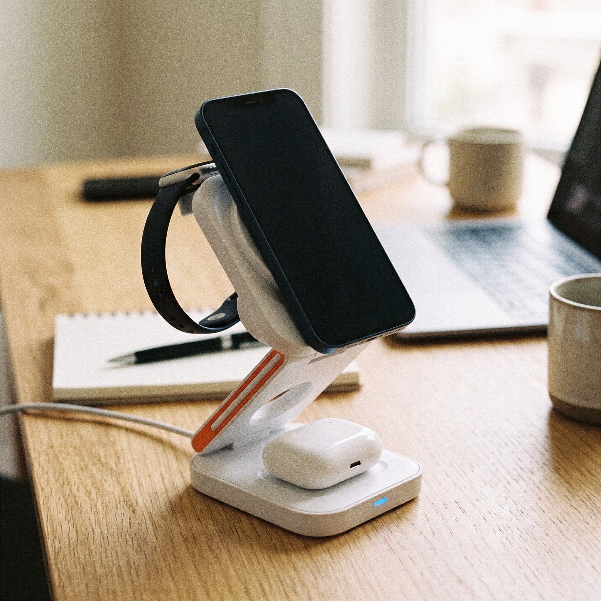 Station beside a laptop at a desk